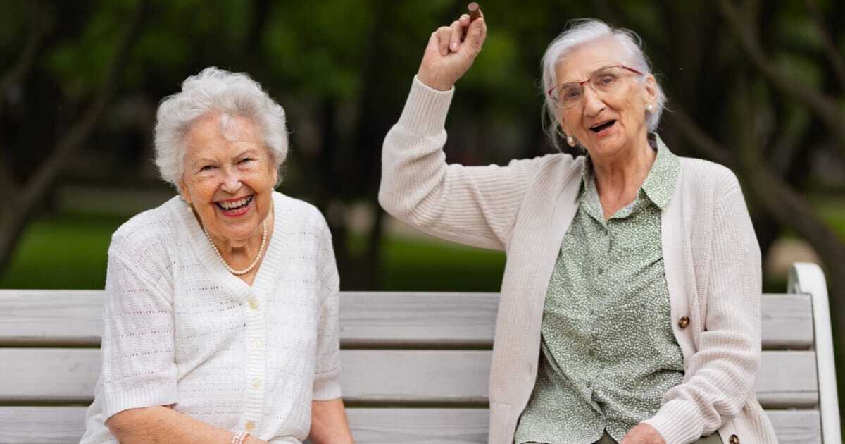 two senior ladies on a bench